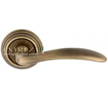 Дверная ручка Extreza SIMONA (Симона) 314 на розетке R05 матовая бронза F03