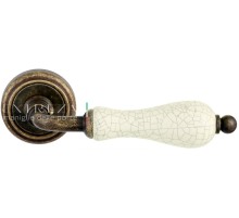 Дверная ручка Extreza DANA CRACKLE (Дана кракле) 306 на розетке R01 античная бронза F23