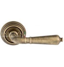 Дверная ручка Extreza Classic PETRA 304 круглая розетка R05 матовая бронза F03