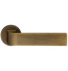 Дверная ручка Extreza Hi-tech SLIM SOUND (Саунд) 106 на круглой розетке R12 матовая бронза F03