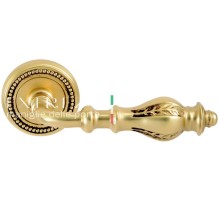 Дверная ручка Extreza EVITA (Эвита) 301 на розетке R03 французское золото + коричневый F59