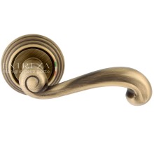 Дверная ручка Extreza BERTA (Берта) 312 на розетке R05 матовая бронза F03