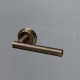 Дверная ручка Extreza CLASSIC PIVOT 132 на круглом основании R02 матовая бронза F03