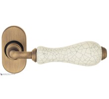 Дверная ручка для профильных дверей Venezia COLOSSEO белая керамика паутинка EP матовая бронза